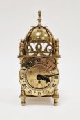 20th century brass cased Smiths lantern clock, the brass chapter ring with Roman numerals denoting