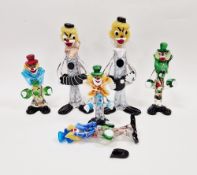 Six Murano glass figures of clowns, including two large figures cased in combed opaque white,