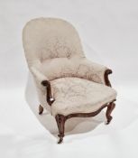 Victorian sewing chair upholstered in a pale pink damask fabric with floral embossed pattern, with a