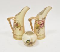 Pair Royal Worcester blush apricot porcelain jugs with branch handles and floral decorated, no.