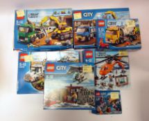 Seven boxed Lego 'City' sets being 60049, 60075, 4203, 60034, 60131, 60018 and 60091 (all understood