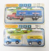 Two carded Matchbox 900 diecast lorry sets including TP-22 long haul and 'Sealand' articulated