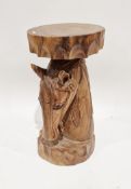 Hardwood stool, the circular seat supported on a base carved in the form of a carousel horse head