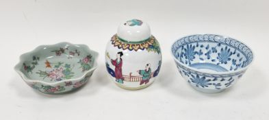 Chinese porcelain dish with wavy border and grasshopper and floral decoration on a celadon ground,