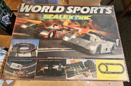 Scalextric boxed C.616 world sport set (unchecked) together with a cased Scalextric car and a