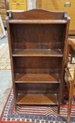 Early 20th century oak bookcase with shaped beaded back and four shelves, 109cm high x 51cm wide x