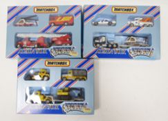 Three boxed Matchbox Convoy Action Pack to include CY201 Fire Department set, CY202 Police Rescue