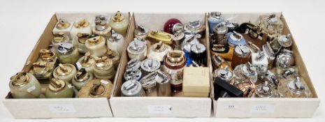 Collection of approximately 62 mid 20th century table lighters including a boxed Ronson Queen
