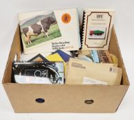 Mixed lot of ephemera including postcards, stamps, stamps on envelopes, toy collectors guides, etc