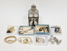 Collection of costume jewellery, including brooches, simulated pearl necklace, a perfume bottle,