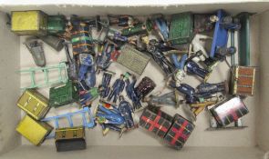 Quantity of Hornby and other accessories to include porter figures, sack trucks and benches