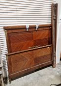 Late 19th/early 20th century French Empire-style double bedstead, with inlaid quarter veneered panel