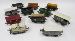 12 various Hornby and other tinplate '0' wagons to include Sir Robert McAlpine & Sons, tipping
