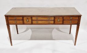 19th century mahogany writing/side table, the rectangular top over an arrangement of eight drawers