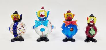 Four Murano glass figures of clowns, all with globular bodies, 23.5cm high max.