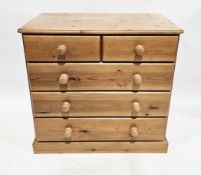 Modern pine chest of two short over three long drawers, raised on a plinth base, 91cm wide x 51cm