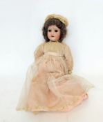 Early 20th century Max Oscar Arnold Welsch bisque head doll with sleeping brown eyes, open mouth