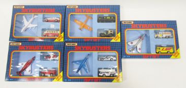 Five boxed Matchbox 'Skybuster' SB-809 diecast three vehicle gift sets, all comprising an airplane