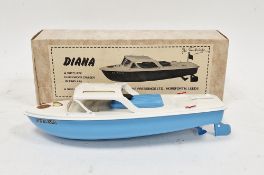 Boxed Sutcliffe Pressings Ltd 'Diana' tinplate clockwork cruiser boat, with key