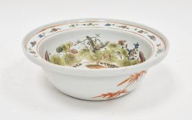 Chinese porcelain basin with figure on horseback, 28cm diameter  Condition Report Surface marks,