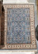 Hand made wool/cotton Kayseriyun rug, blue backround with floral design in red, mustard, craem and