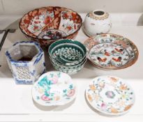 Collection of Chinese and Japanese porcelain, including: a famille rose stand, a ginger jar, a