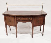 George III mahogany and satinwood crossbanded bowfront sideboard with brass gallery rail to back and