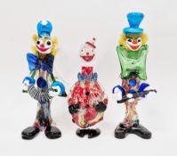 Three Murano glass figures of clowns, including an example playing an accordion and another with a