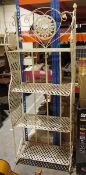Large ornate metal garden plant stand with white finish and four folding shelves, pierced and