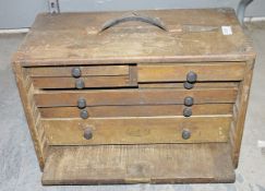 Late 19th/Early 20th century wooden carpenters multi-drawer tool cabinet, the drop down front
