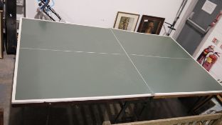 Hanimex super sporting folding table tennis or ping pong table, held on a metal frame with