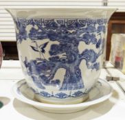 Large Chinese-style decorated jardiniere showing cranes in a cherry tree, 32cm high and a blue and