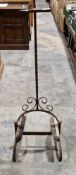 Wrought iron boot scraper with long handle and two fitted scrubbing brushes