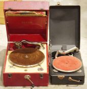 Two portable wind-up gramophones including a red cased Decca 50 gramophone and a black metal cased