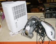 Airmaster Dehumidifier, model no. DH12L together with two hand held vacuum cleaners being Hoover