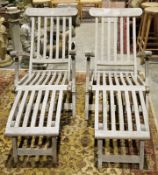 Pair of Mayfair Collection folding teak garden loungers (2)