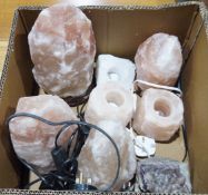 Four various salt lamps, a pair of salt tea light holders, a single salt tea light holder and a