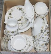 Royal Doulton 'Larchmont' part dinner service to include 11 dinner plates, eight fish plates, 12 tea