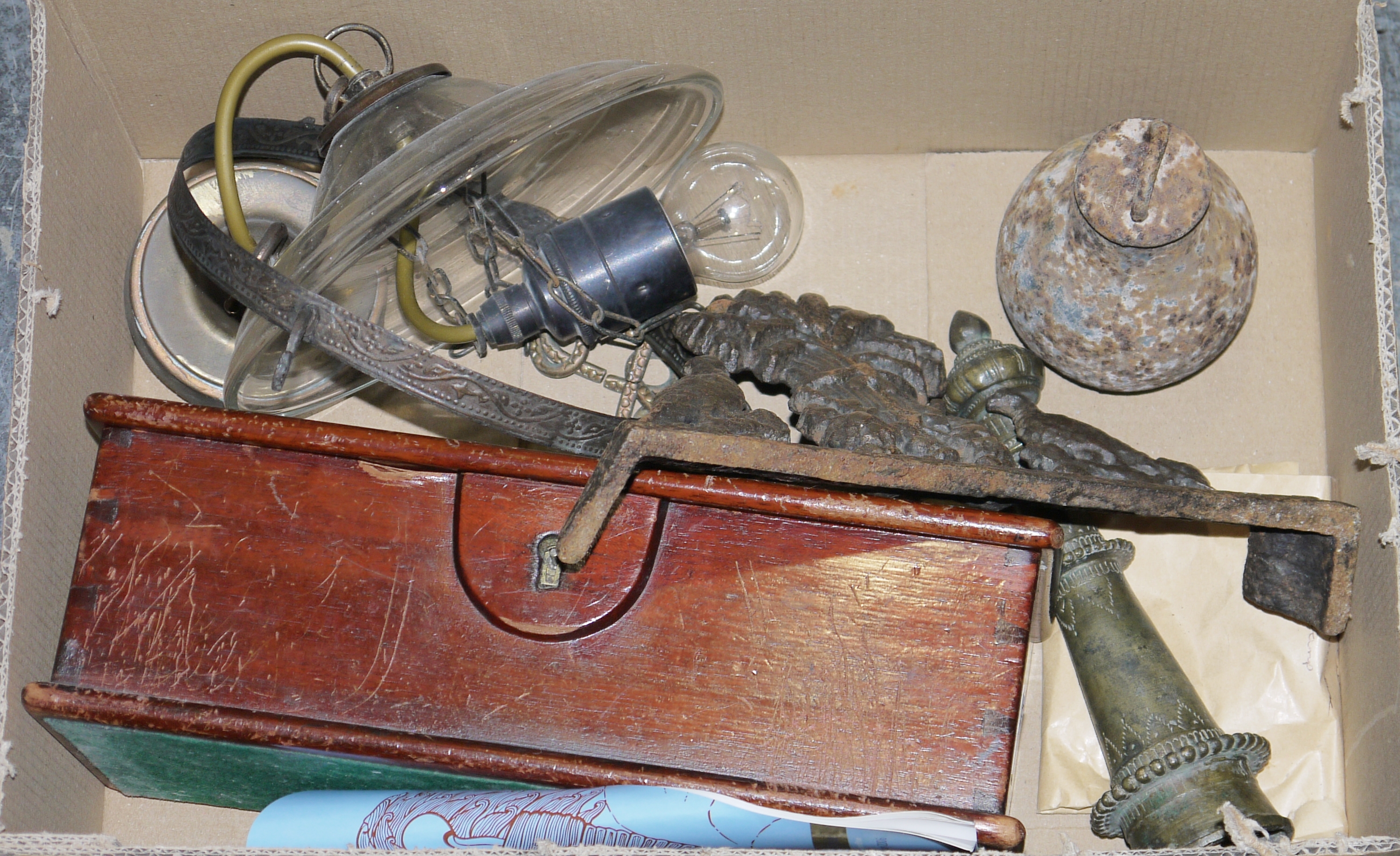 Three chandeliers, a vintage glass and metal ceiling light, a cast iron doorstep featuring pheasants