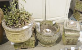 Large circular stone garden planter, 27cm high, a square reconstituted stone garden planter, another