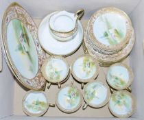 20th century Chinese porcelain part tea set decorated in famille verte colours with dragons