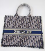 Christian Dior Book Tote bag, woven blue Dior logo and name 'Christian Dior Paris' on one side,