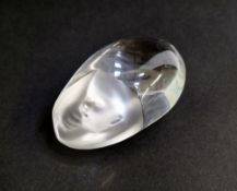 Baccarat clear and frosted glass paperweight in the form of an egg with baby's head and hands