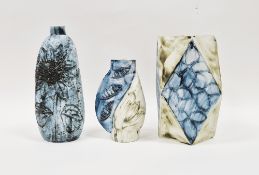 Three Carn Pottery vases by John Beusmans, with tube lined floral decoration, all signed and with