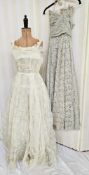 A 1950's grey lace strapless evening dress, ruched bodice, the lace overlaid a pale pink satin and