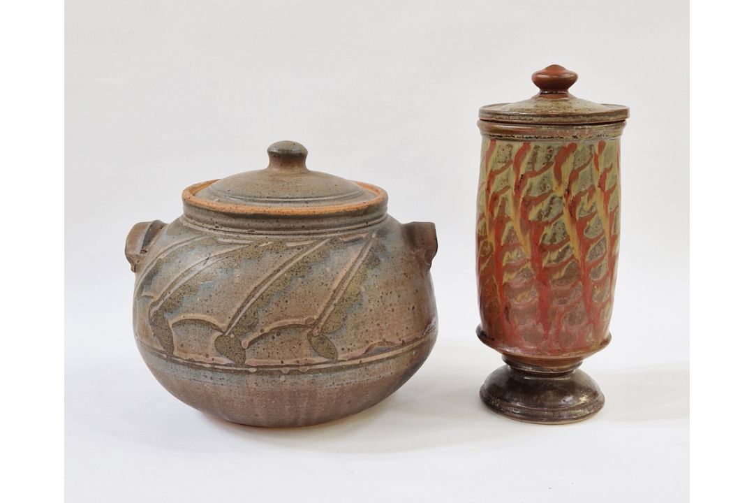 A large studio pottery lidded casserole with pale pink and blue hue glazed resist decoration on - Image 1 of 2