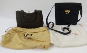 Salvatore Ferragamo dark blue leather handbag, gilt metal fastening with logo, a removable leather