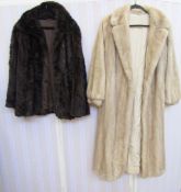 A pale blonde full length vintage mink coat, cuffed sleeves, with a dark brown mink jacket, the
