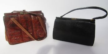 Two vintage handbags, black lizard skin, with gilt metal hardware, single strap, bearing label