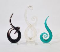 Three Murano-style glass swirl sculptures, clear, amethyst and green colourways, tallest 35cm (3)
